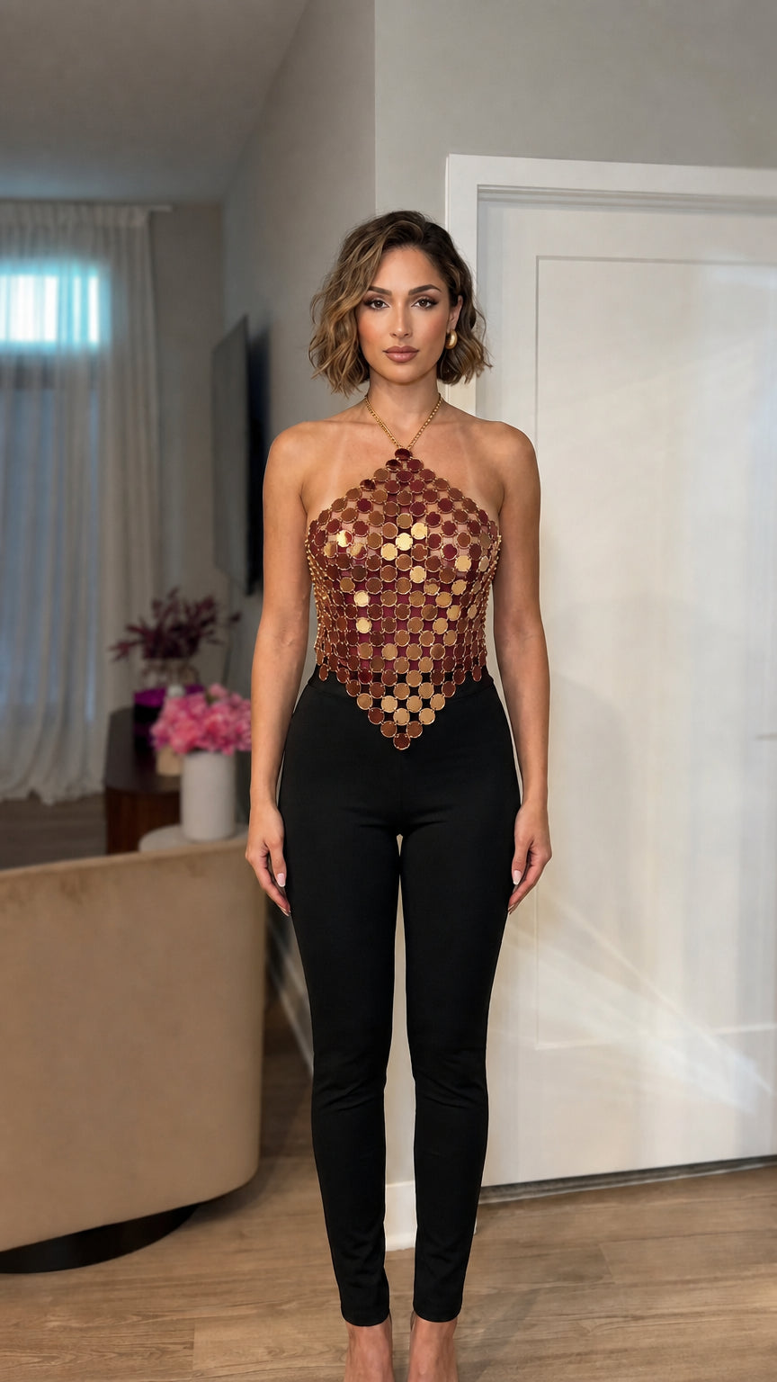 Model wearing bronze metallic sequin halter top