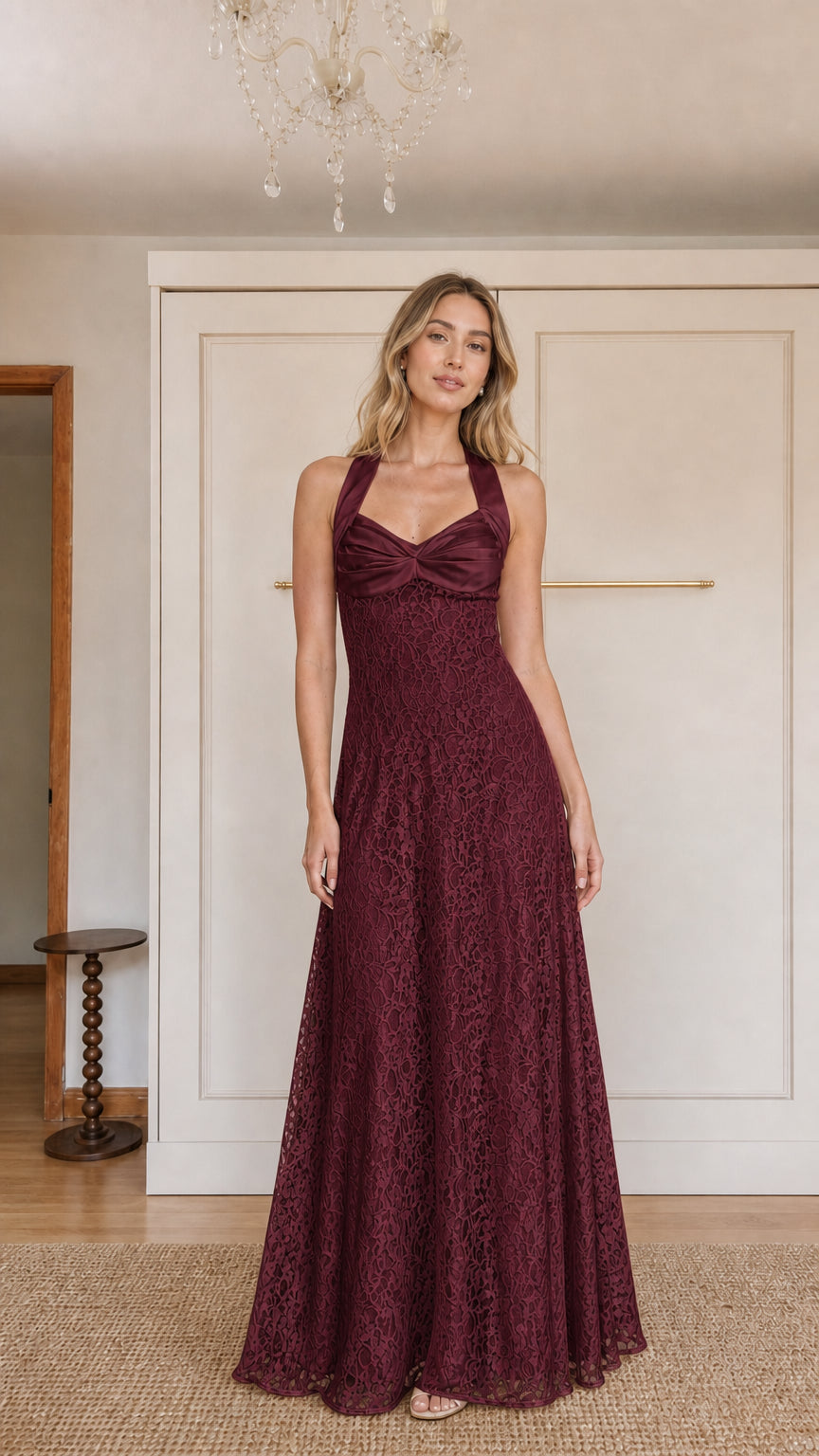 Front view of model wearing Burgundy halter neck lace maxi dress
