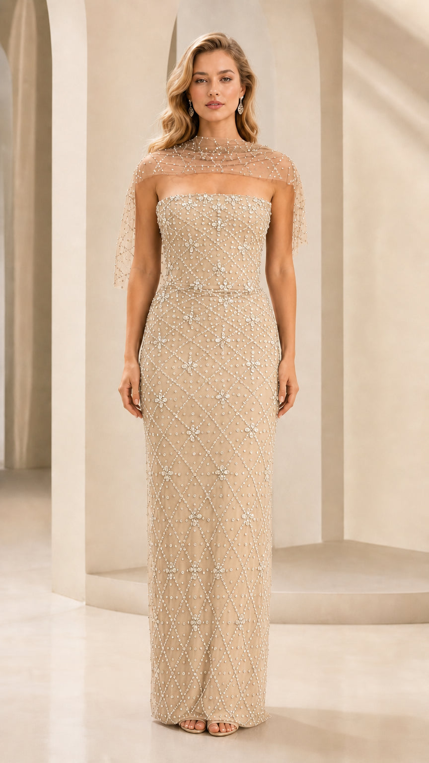 Front view of champagne beaded strapless evening gown