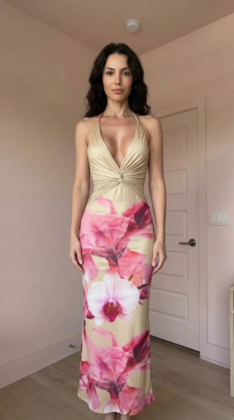 Model wearing champagne and pink floral print halter maxi dress