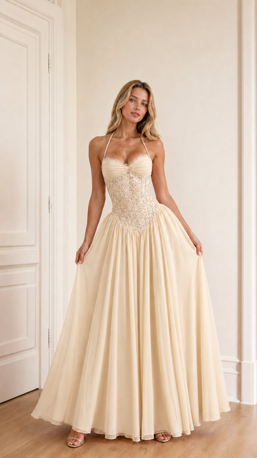 Model wearing champagne evening dress front view