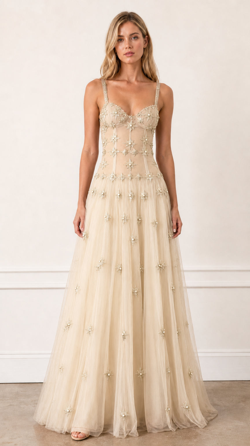 Front view of Champagne embroidered starburst tulle evening gown