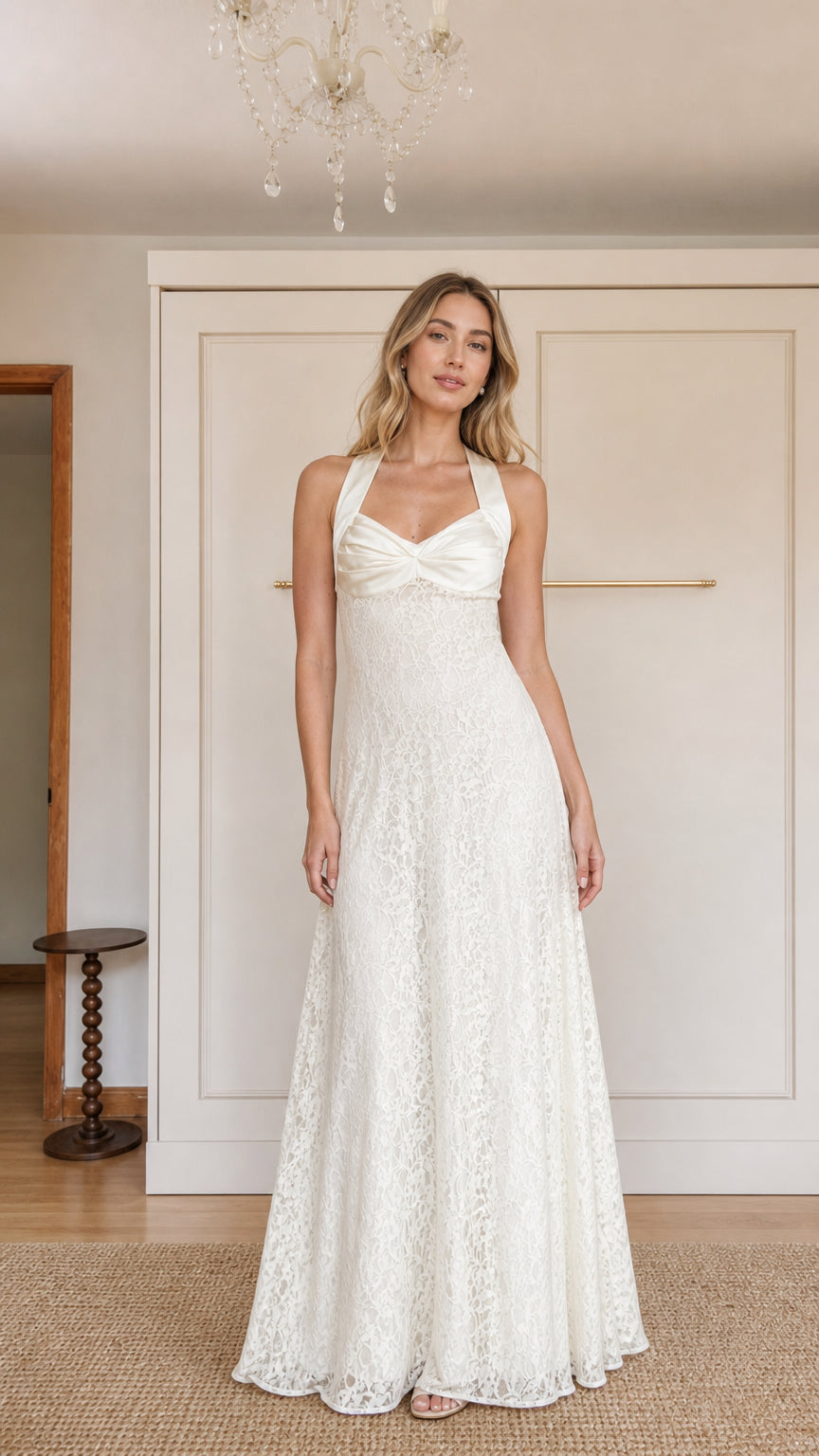 Front view of model wearing White halter neck lace maxi dress