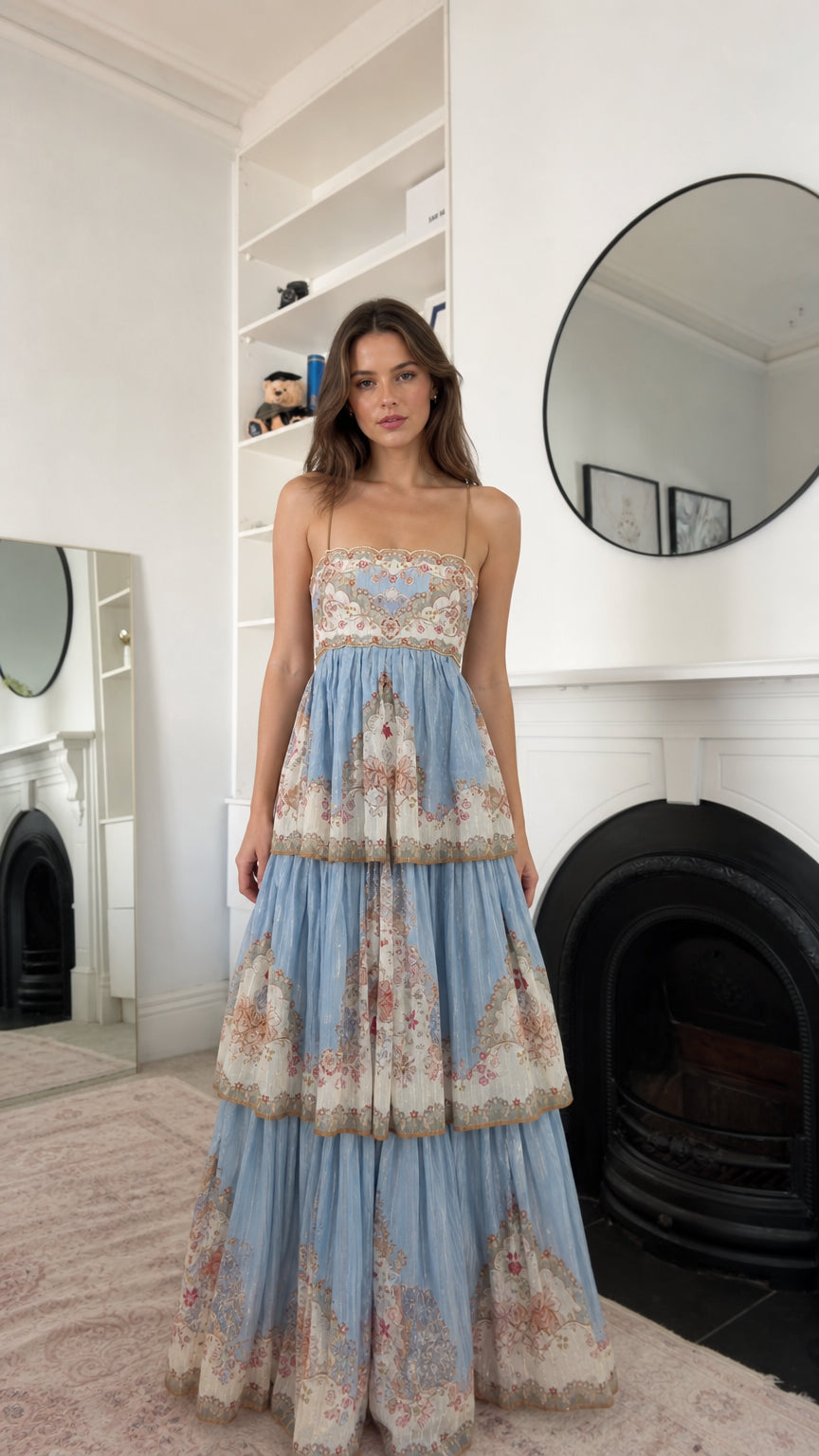 Sky blue floral tiered maxi dress shown from the front