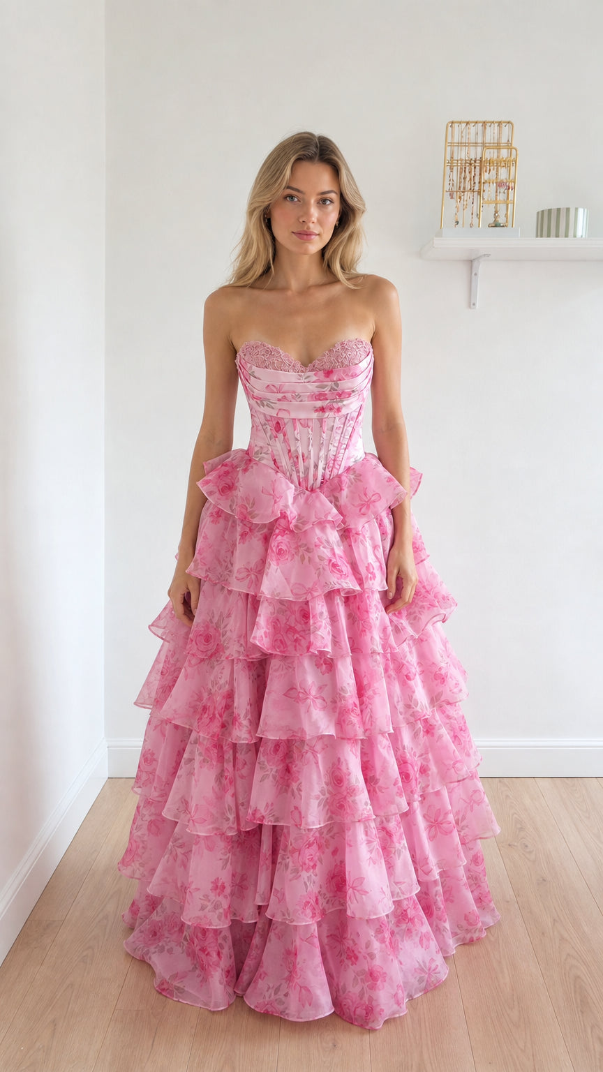 Front view of pink floral strapless corset ball gown