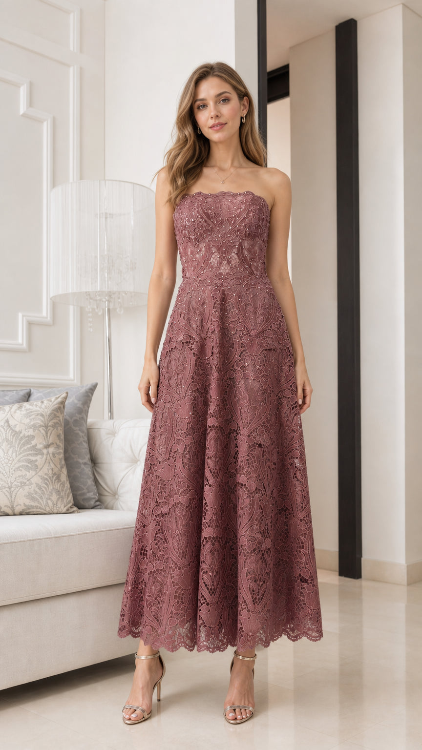 Front view of model wearing mauve strapless lace midi dress