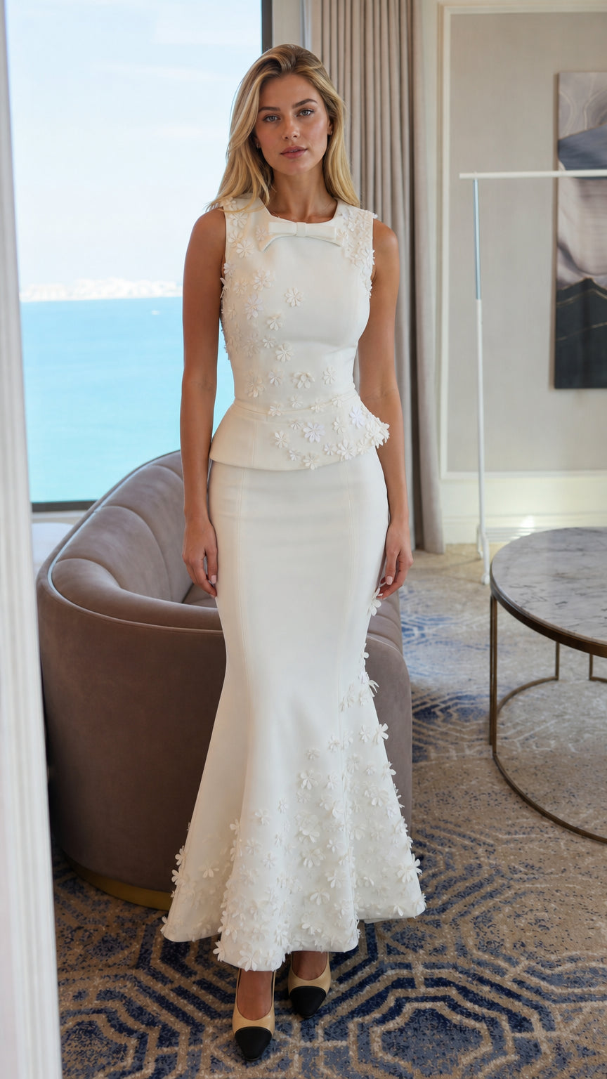 Front view of white 3D floral peplum mermaid maxi dress