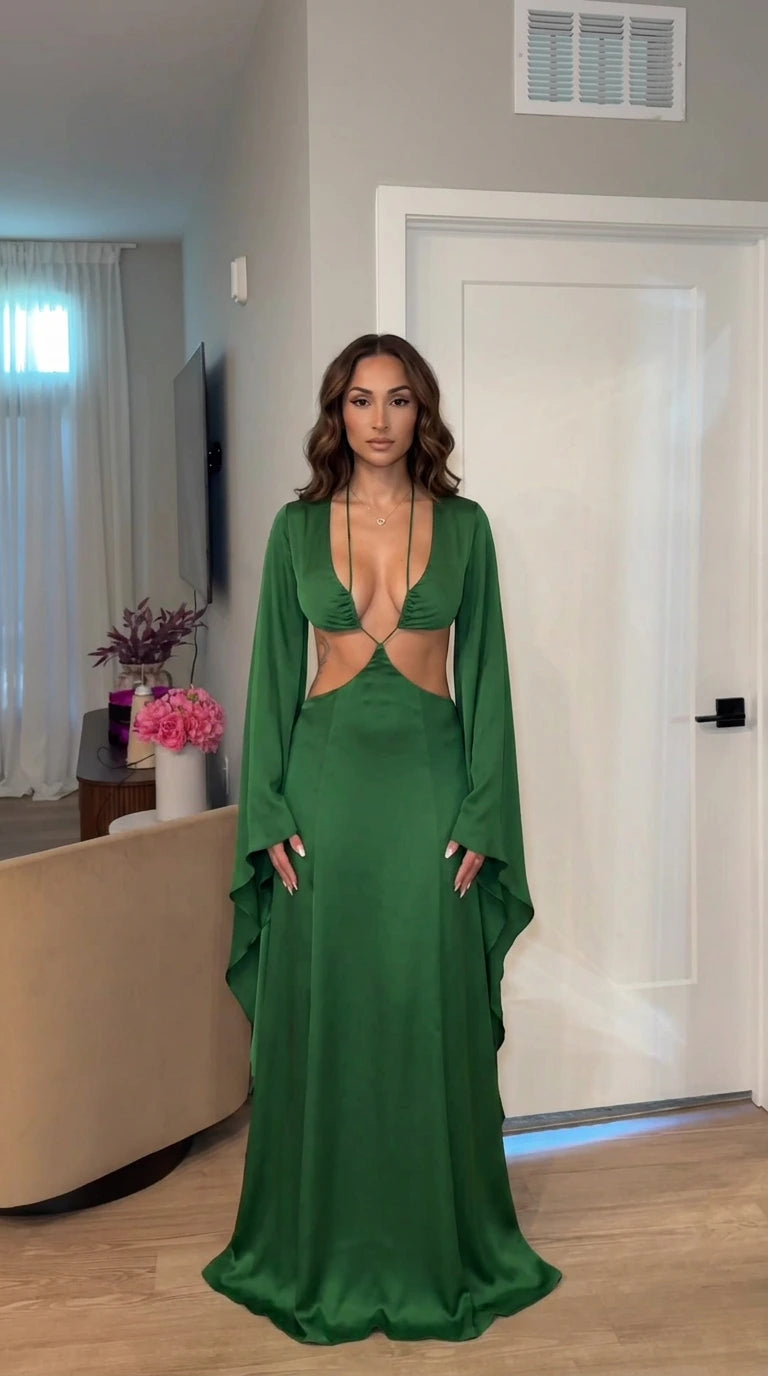 Front view of model wearing green cutout long sleeve maxi dress