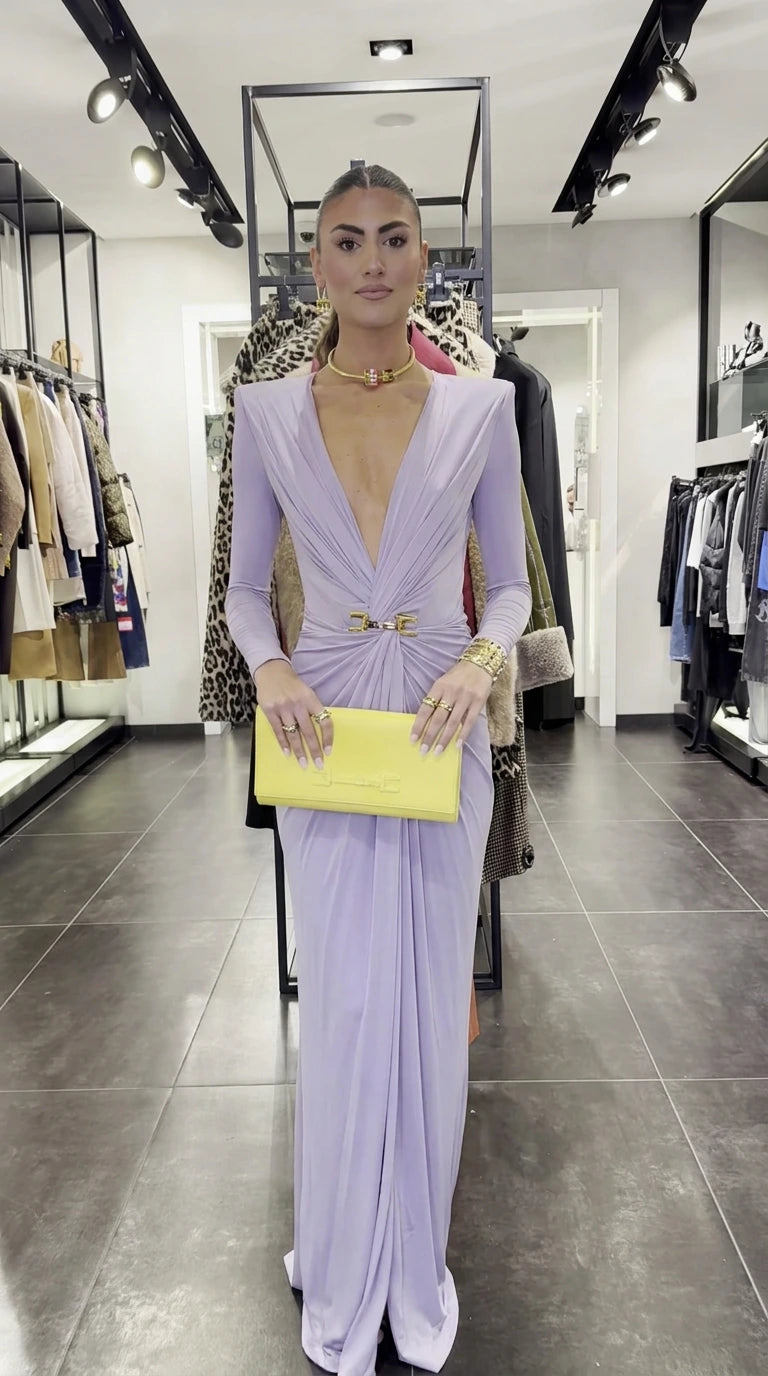 Front view of lavender long-sleeve maxi dress with gold belt accent