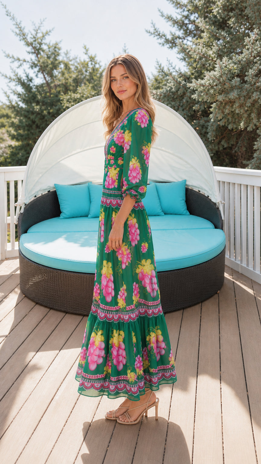 Side profile view of green floral maxi dress