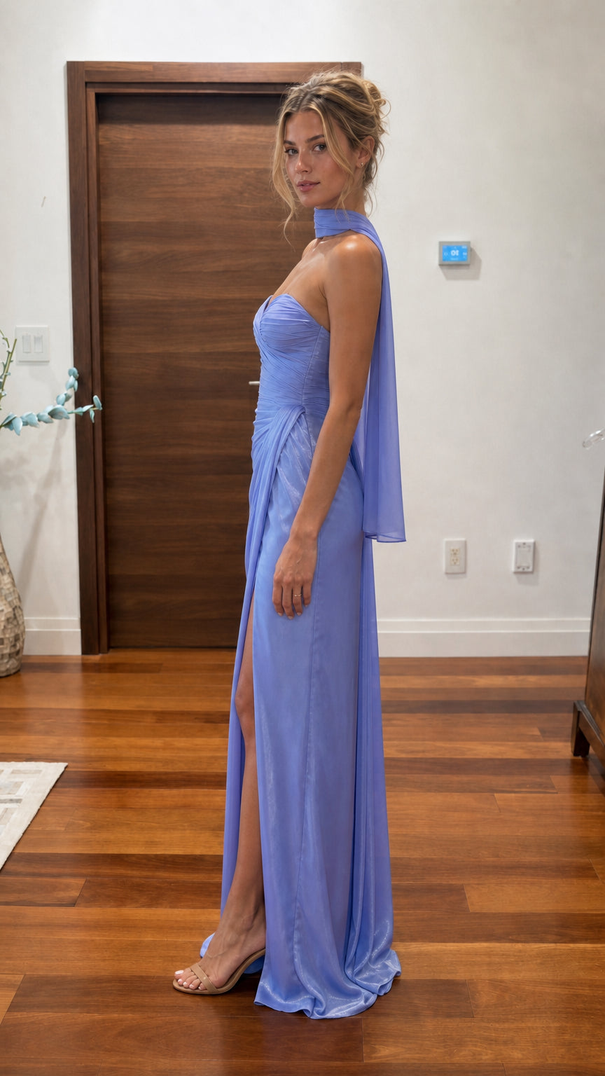 Lavender halter evening maxi dress shown from the side with flowing scarf detail