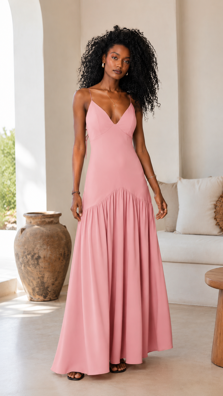 Blush pink sleeveless maxi dress with flowing skirt and V neckline front view