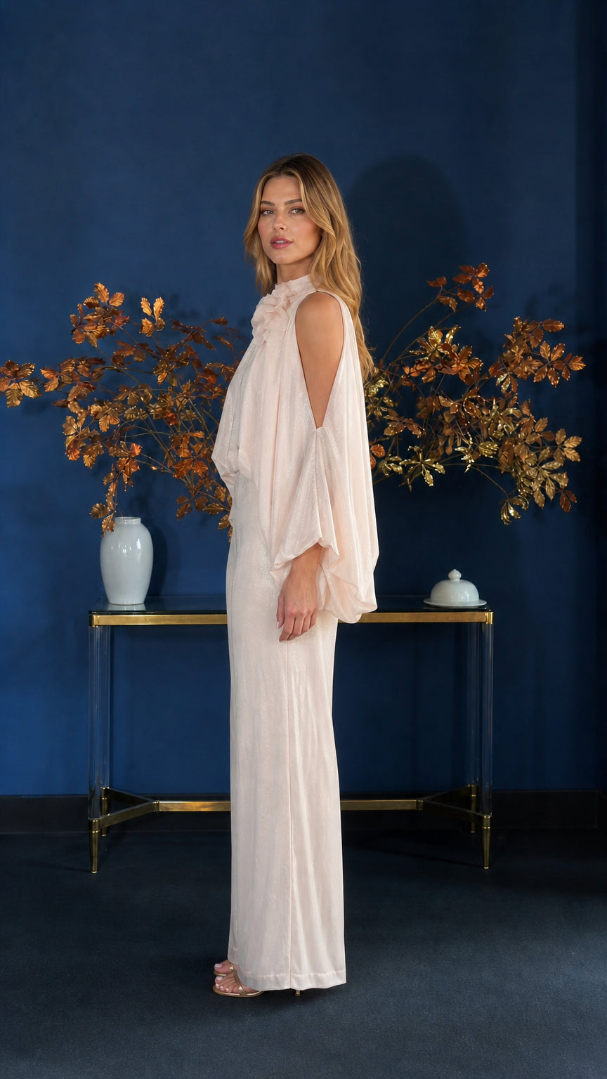 Side profile view of champagne jumpsuit showing wide leg silhouette