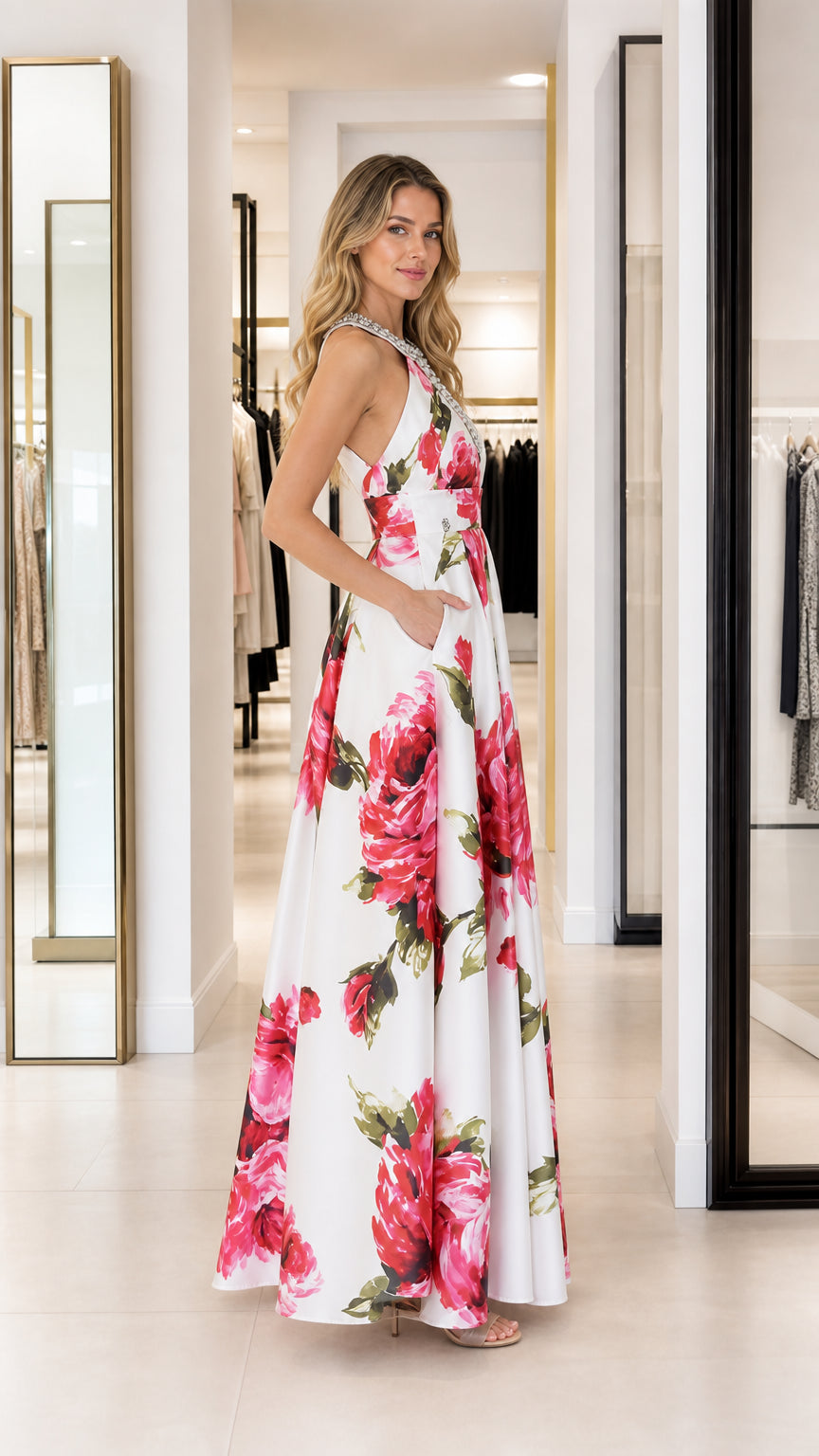 Side profile view of white floral maxi dress with pockets