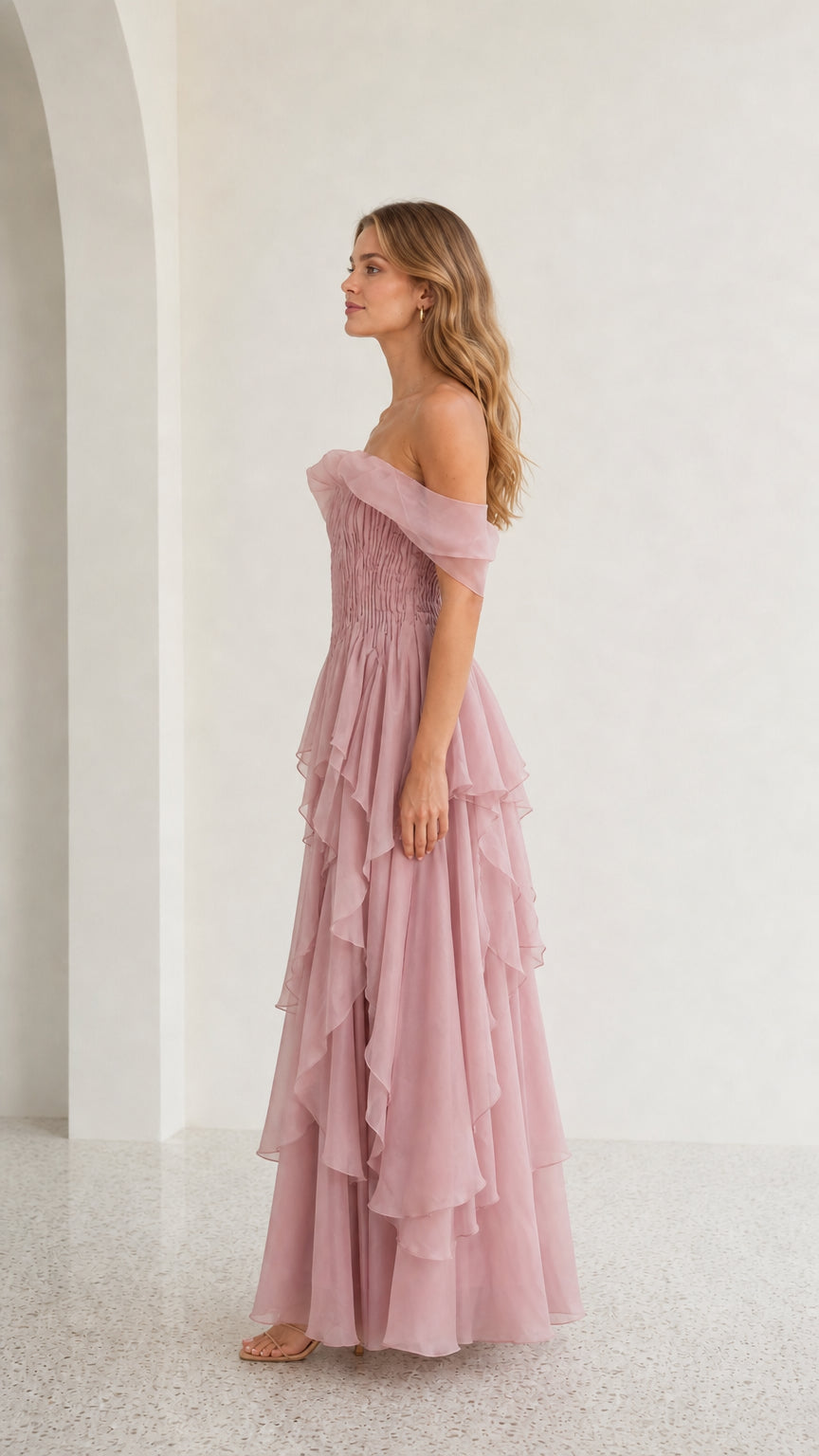 Side profile view of mauve off-shoulder dress