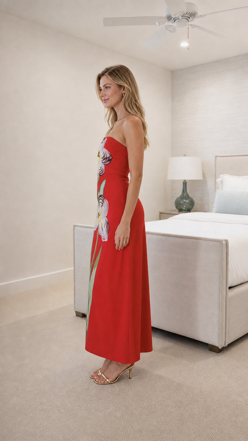 Side view of model in red strapless floral dress