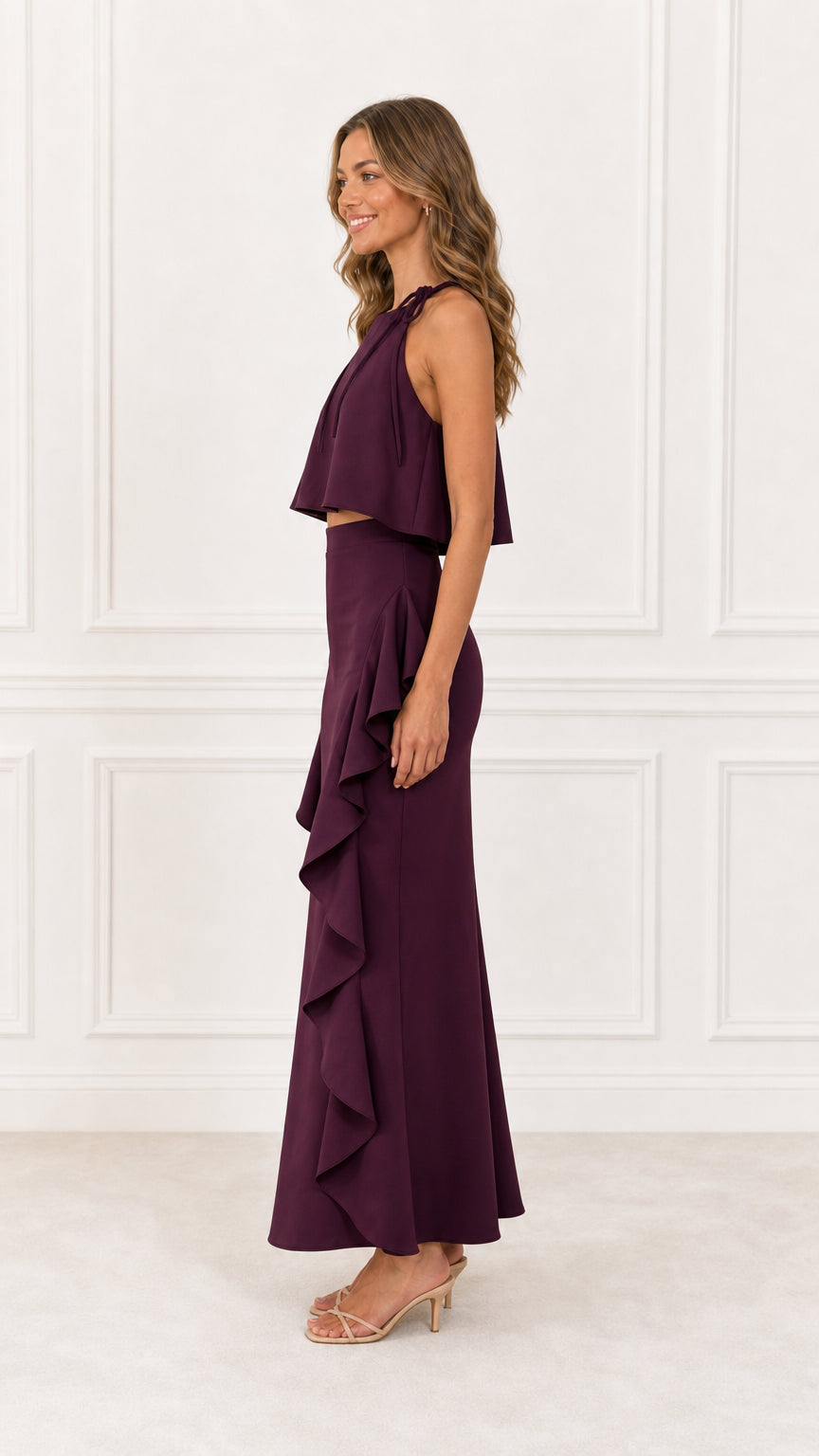 Model wearing Burgundy Two-Piece Ruffle Maxi Dress Set from the side