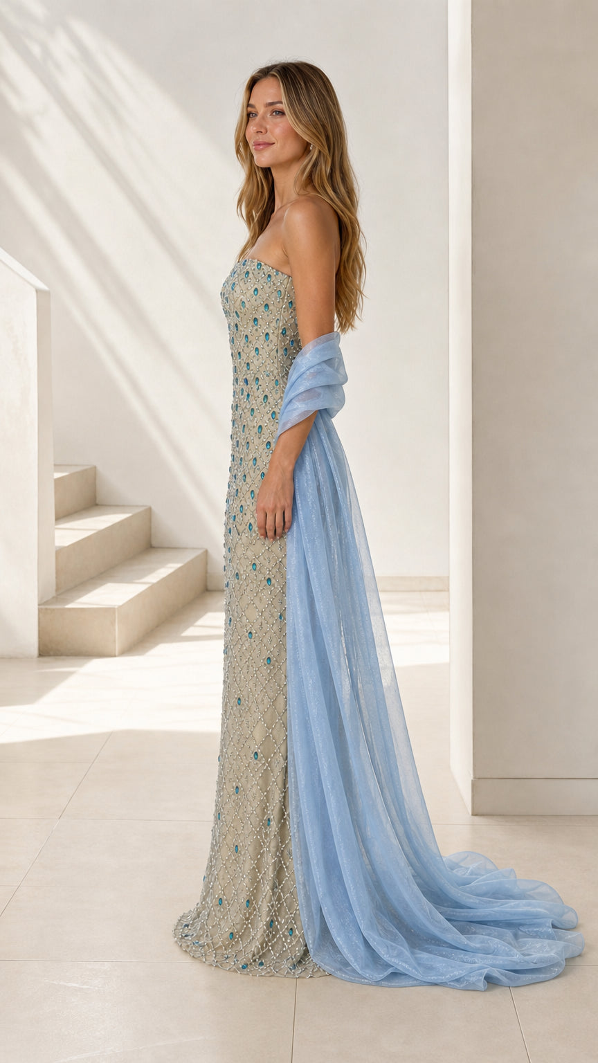 Side profile view of champagne beaded evening gown