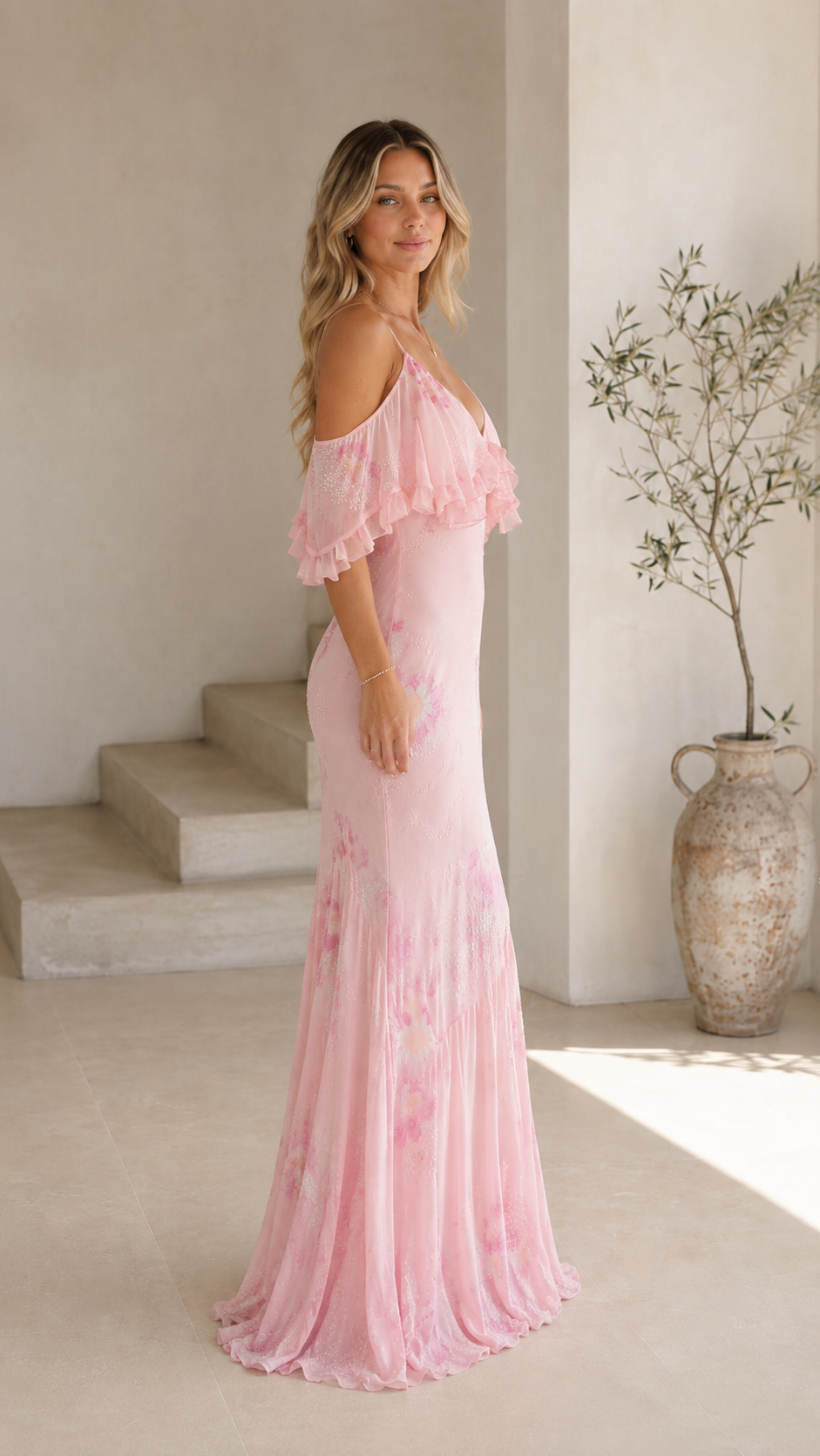 Blush pink floral maxi dress side view with flutter ruffle overlay