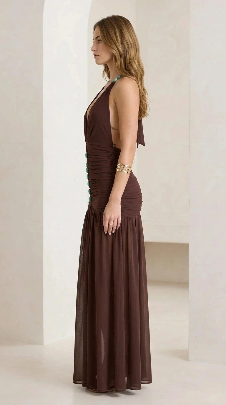 Side view of brown halter neck ruched maxi dress