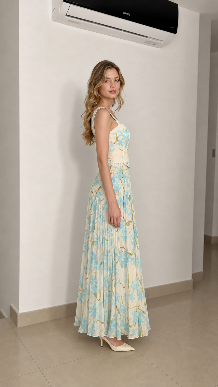 Model wearing ivory floral maxi dress from the side