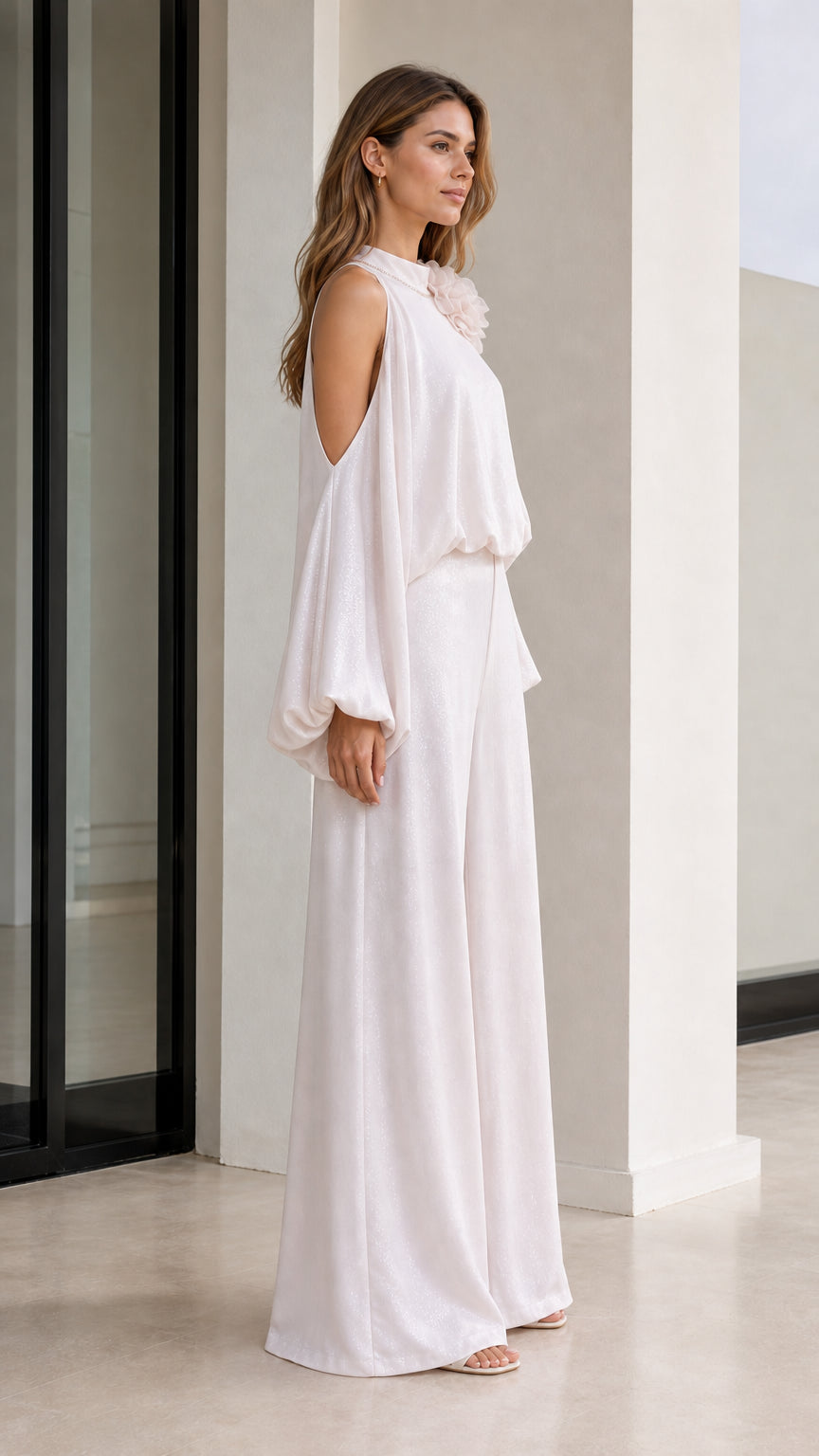 Side profile view of the white two-piece apparel set