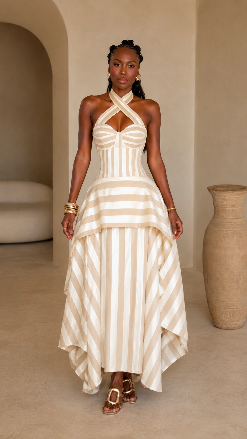 Front view of cream striped cross halter corset maxi dress