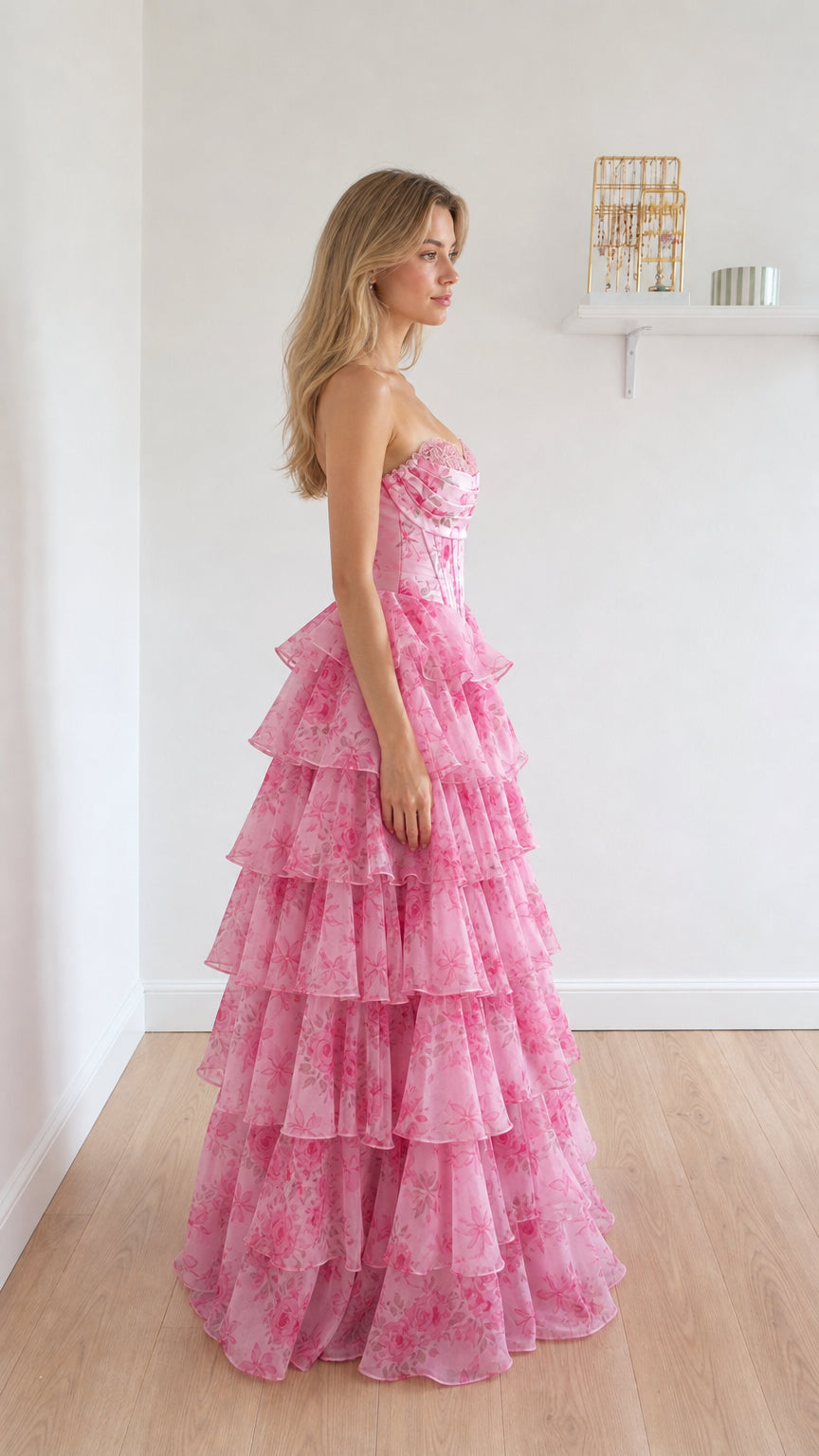 Side view of pink floral ruffle gown