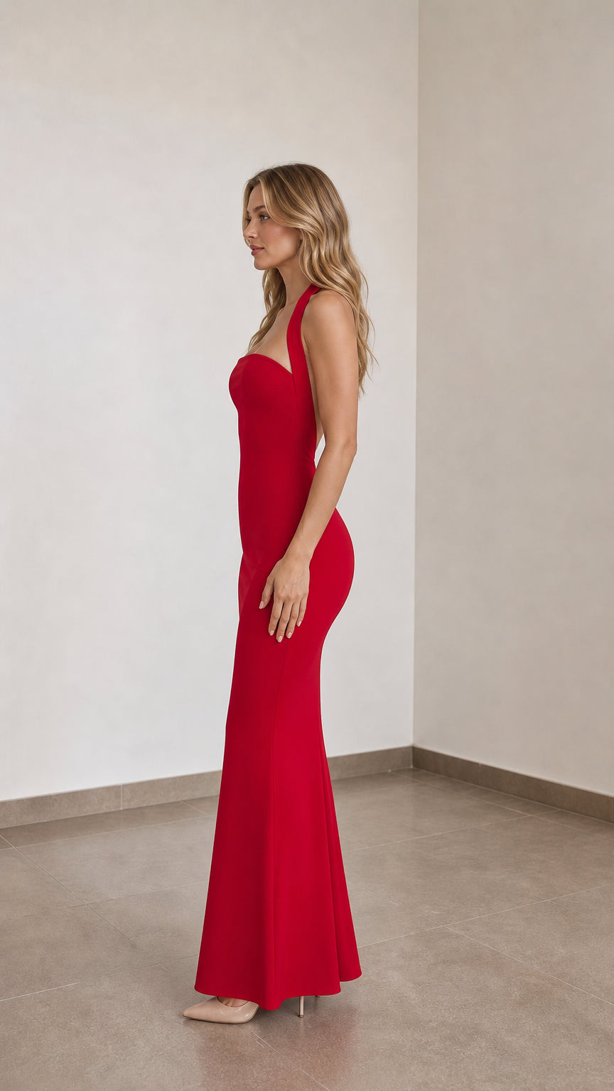 Model wearing red halter neck mermaid long dress side view