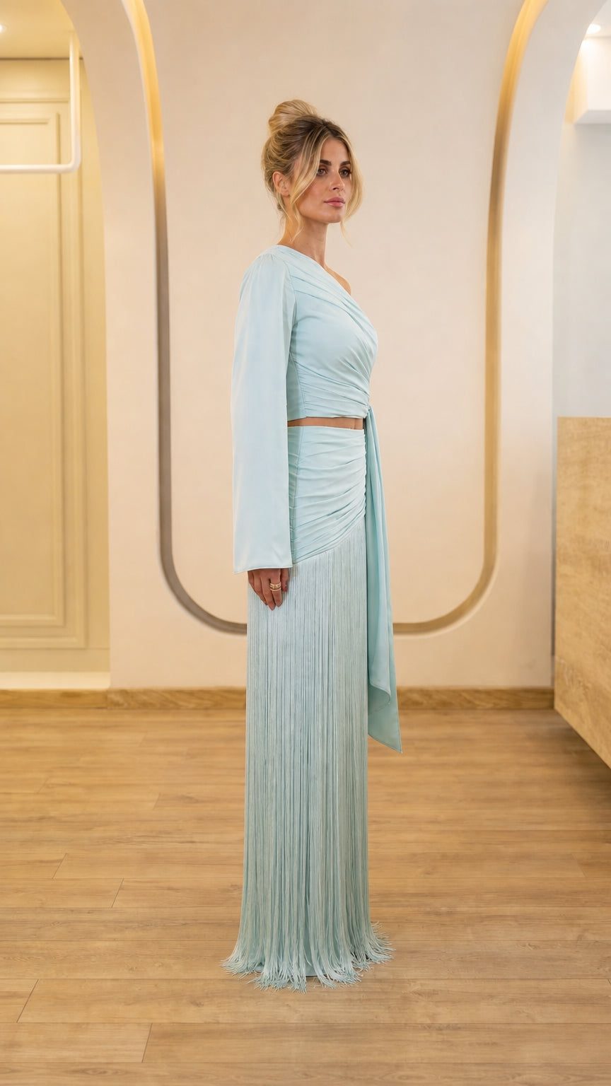 Side profile view of light blue two-piece set
