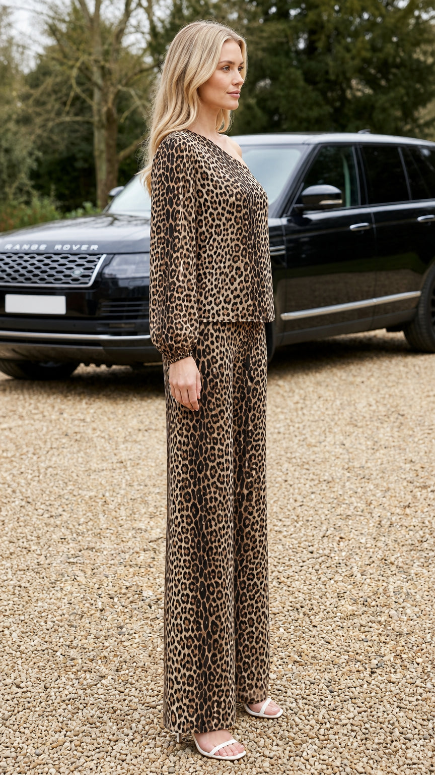 Side profile of model in brown leopard print matching set