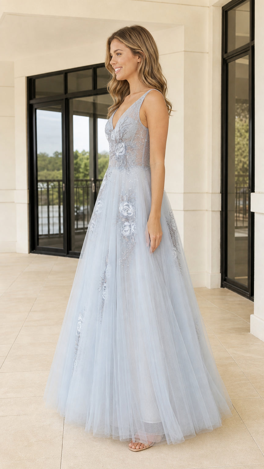 Side profile of light blue embroidered tulle ball gown