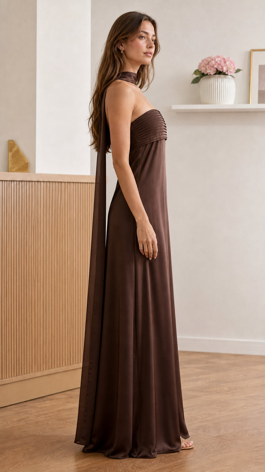 Side view of model in brown maxi dress with necktie