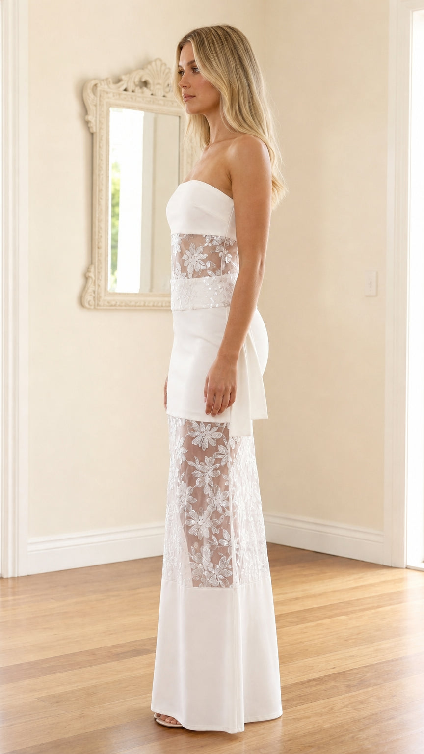 Side profile view of white strapless sequin mesh maxi dress