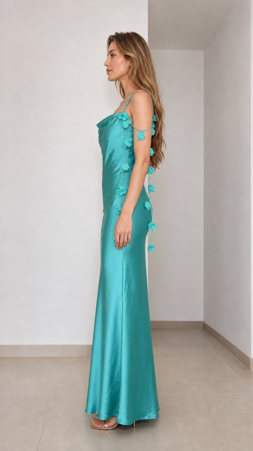 Side profile of teal satin maxi dress