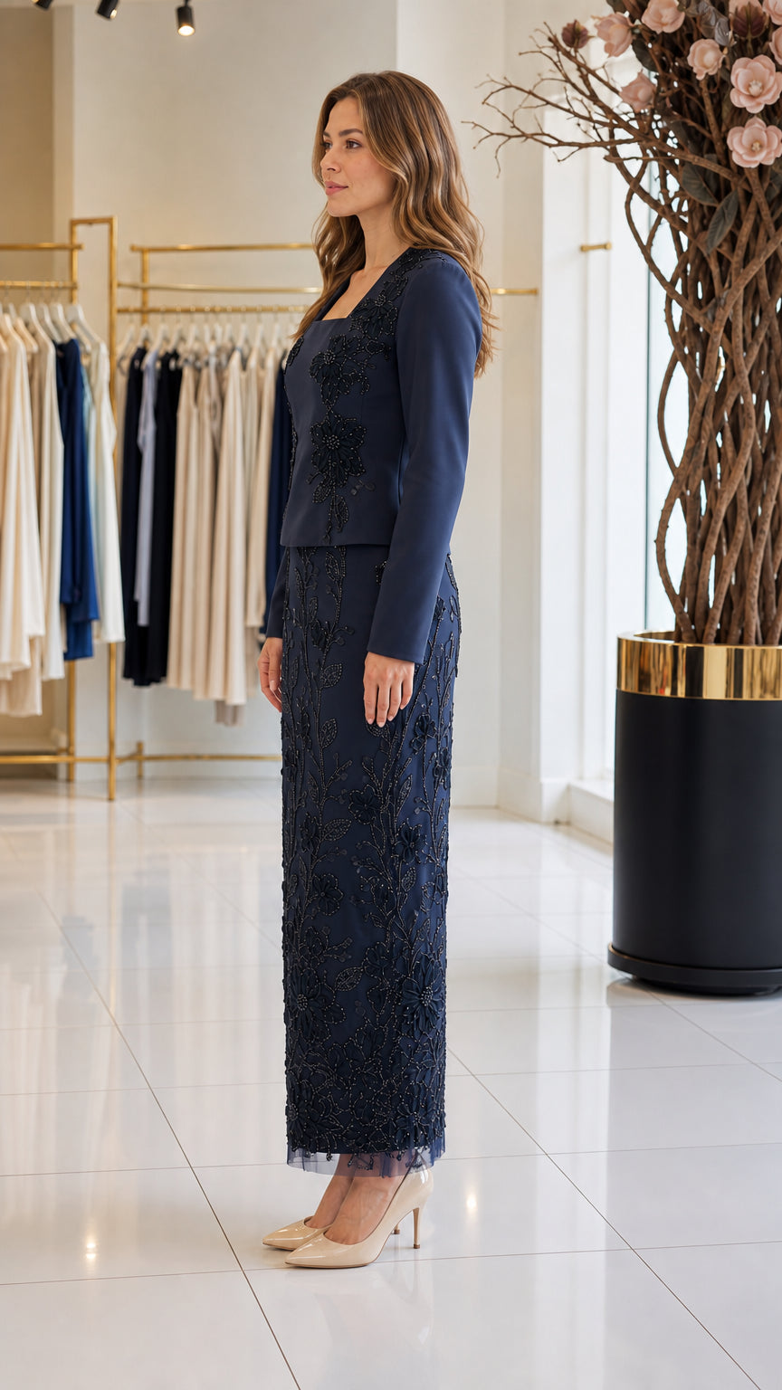 Side profile of navy blue formal dress showing long sleeves and structured fit