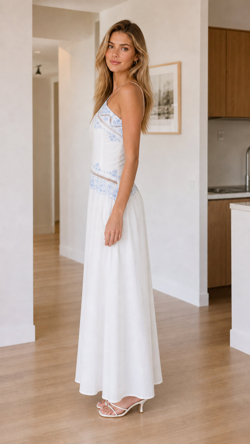 Side profile of white one-shoulder maxi dress