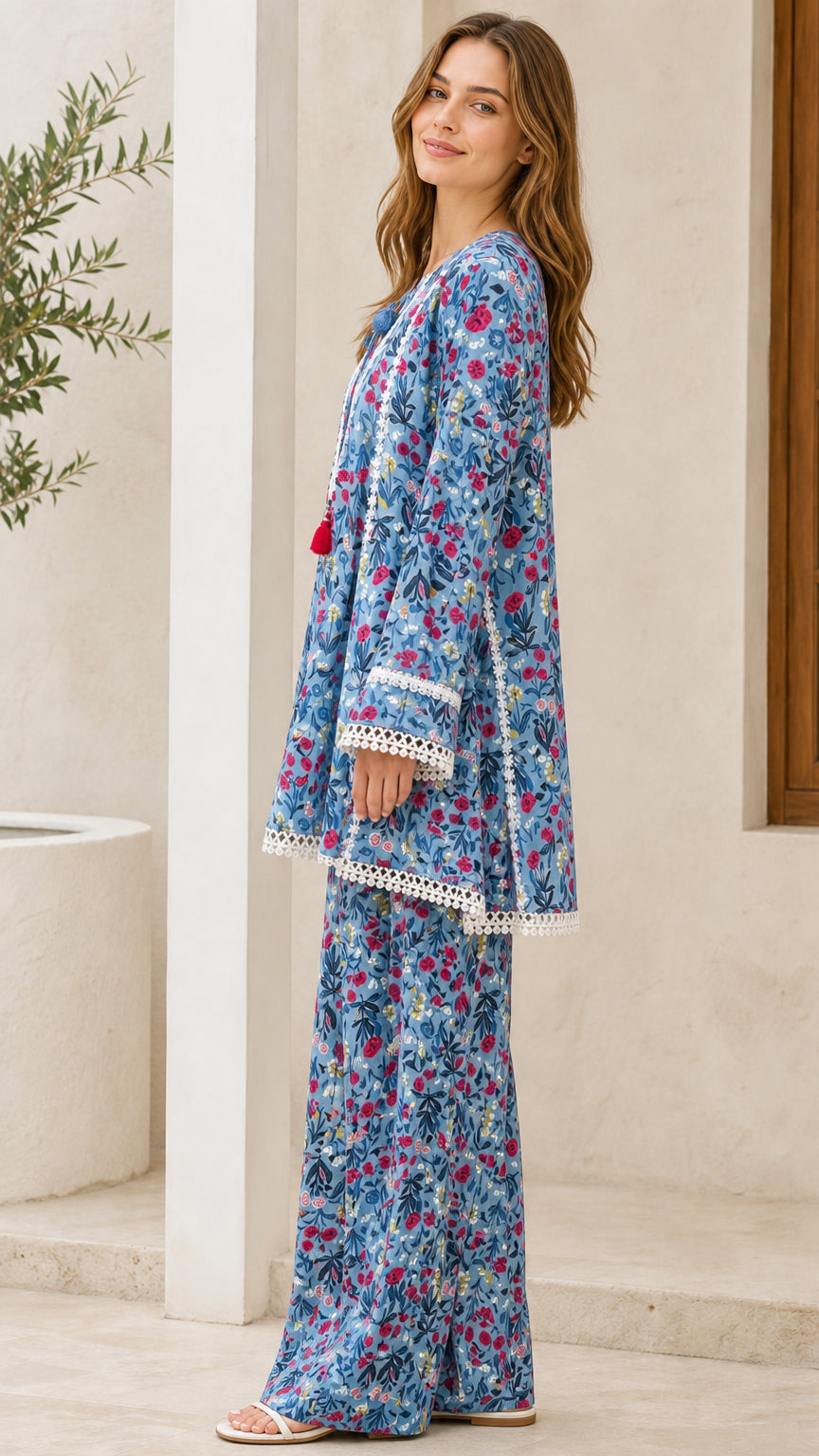Model wearing blue floral two-piece set side view