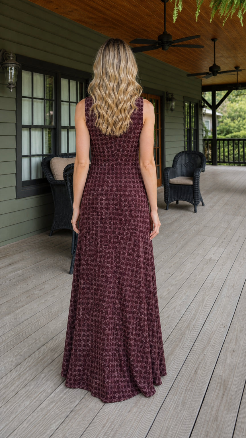 Back view of woman wearing burgundy maxi dress
