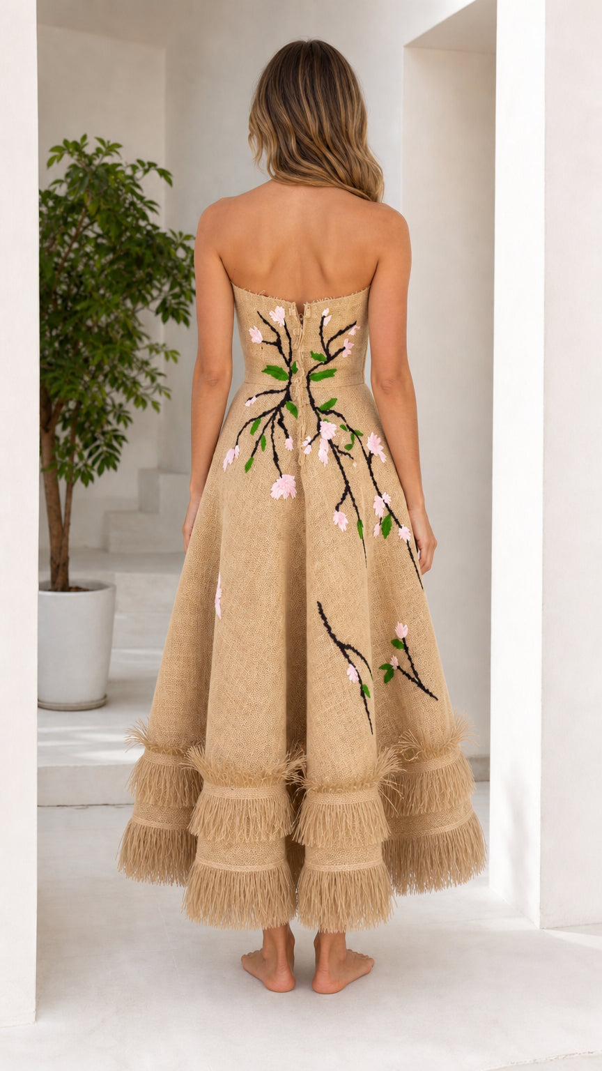 Back view of khaki floral embroidered strapless midi dress