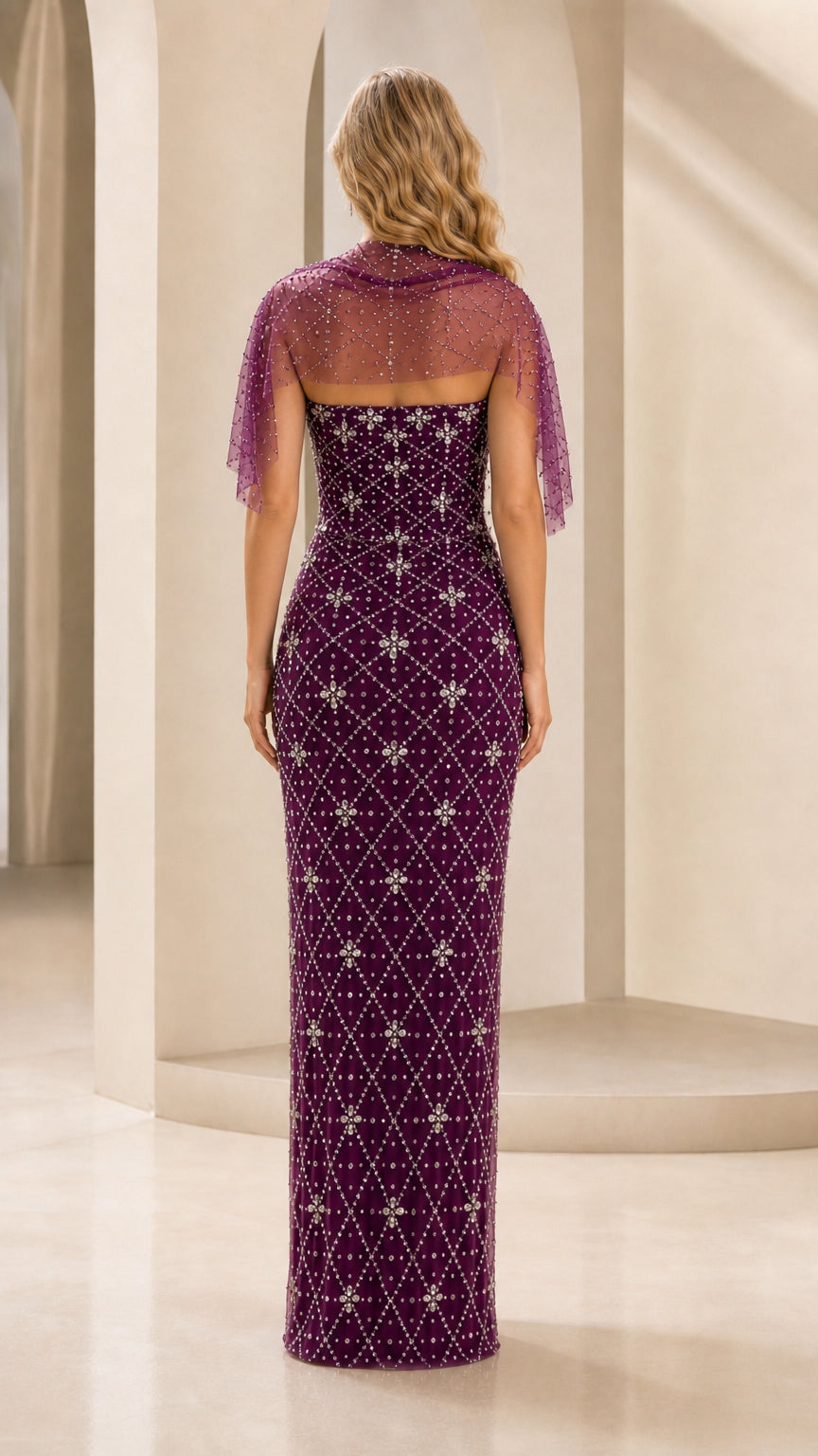 Back view of purple beaded formal gown showing shawl drape