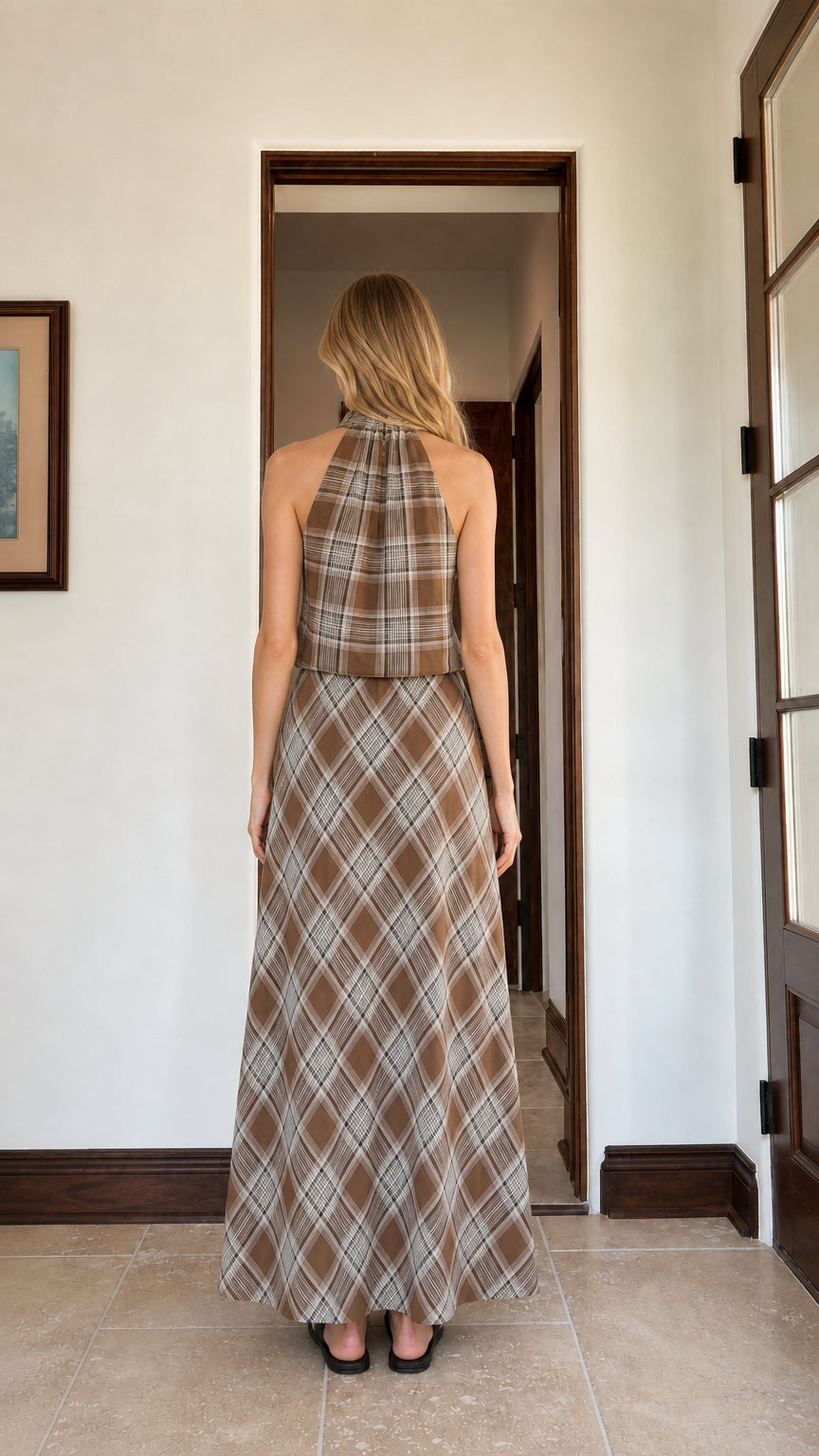 Back view of woman wearing brown plaid two piece set