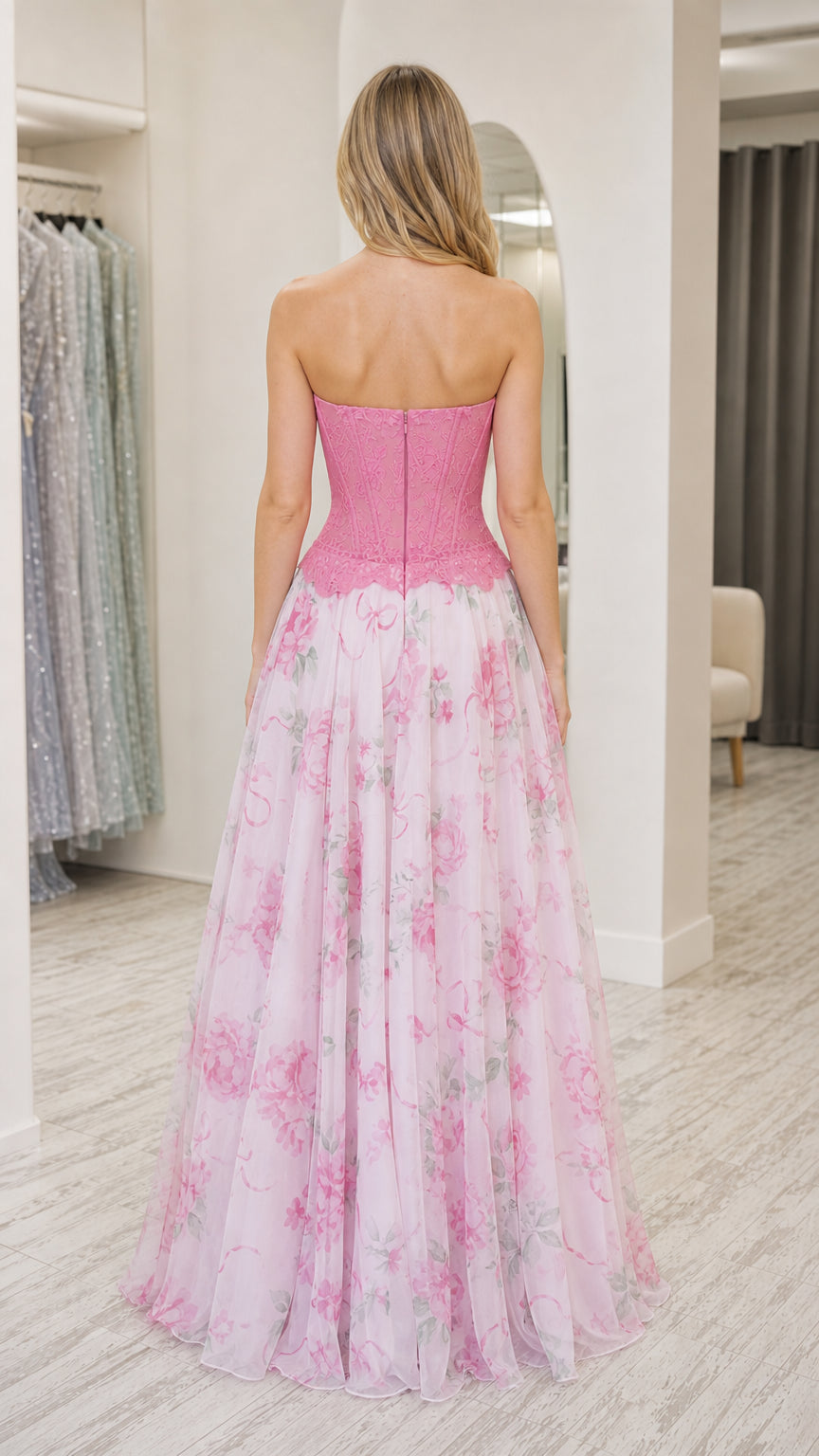 Model wearing pink strapless floral corset long dress back view