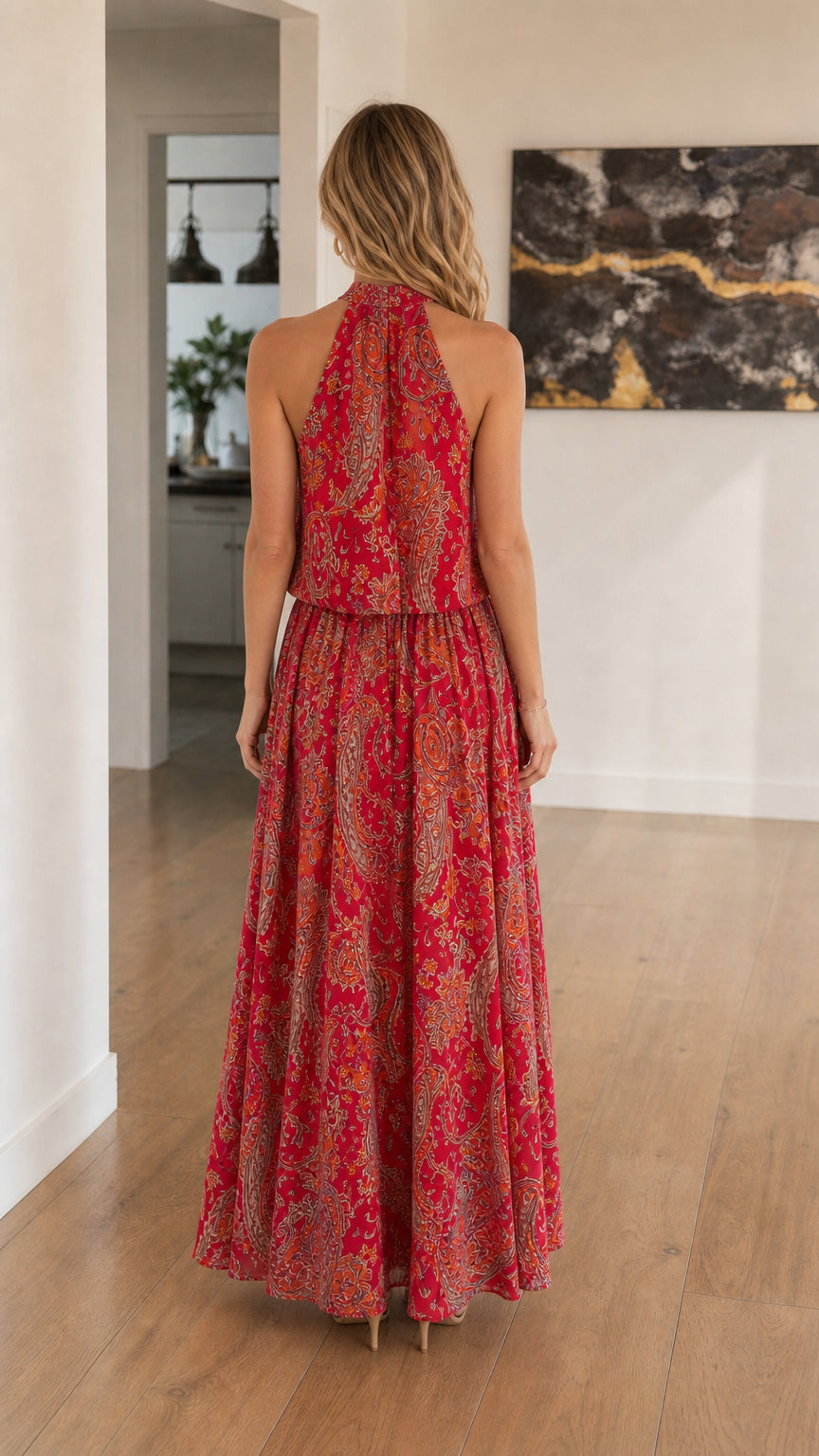Back view of woman wearing Red Bohemian Paisley Halter Maxi Dress