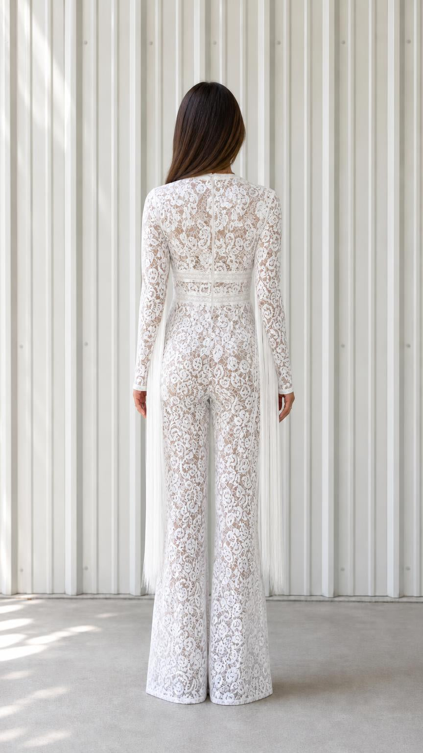 Back view of woman wearing white lace jumpsuit