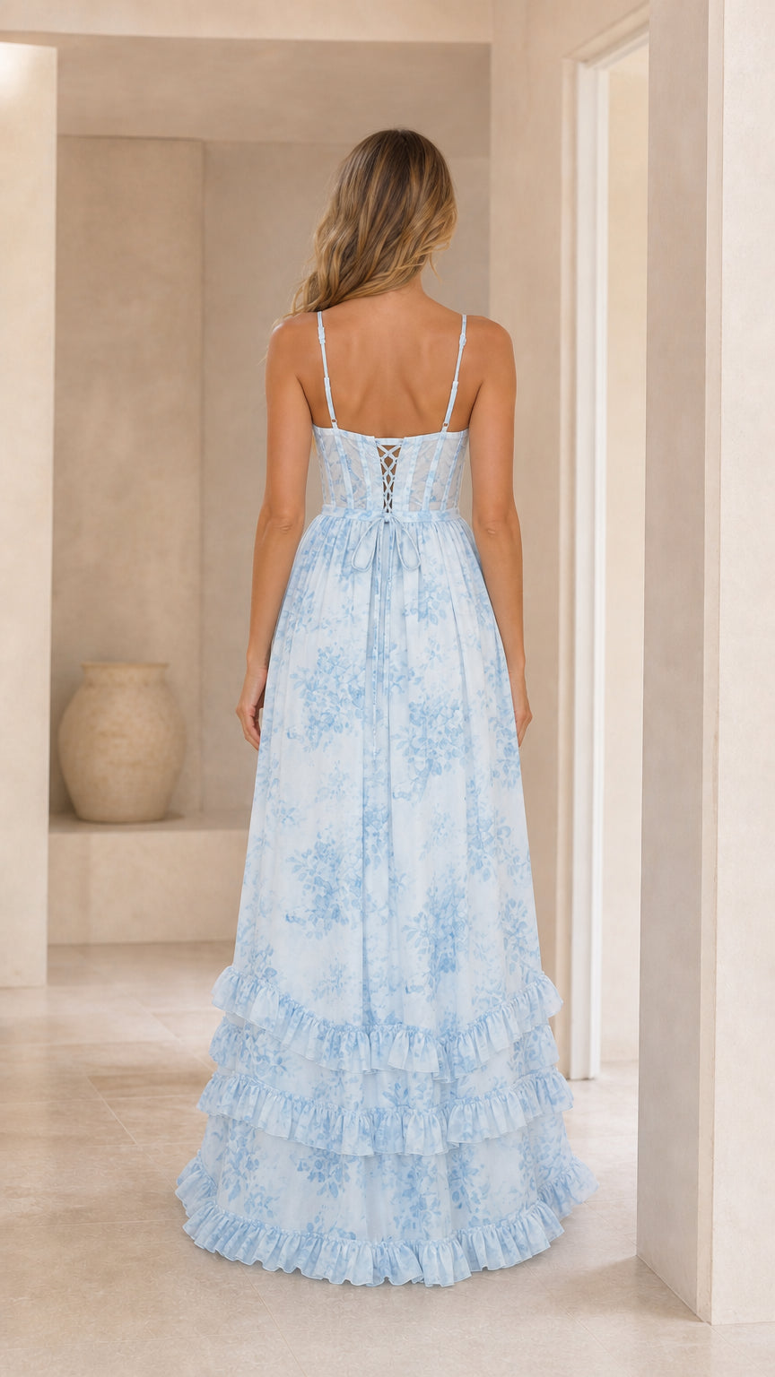 Back view showing lace-up corset detail on light blue dress