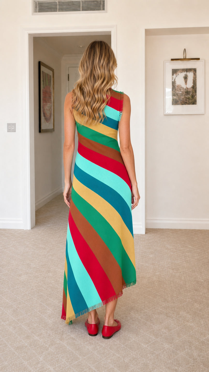 Back view of the colorful diagonal stripe sleeveless knit dress