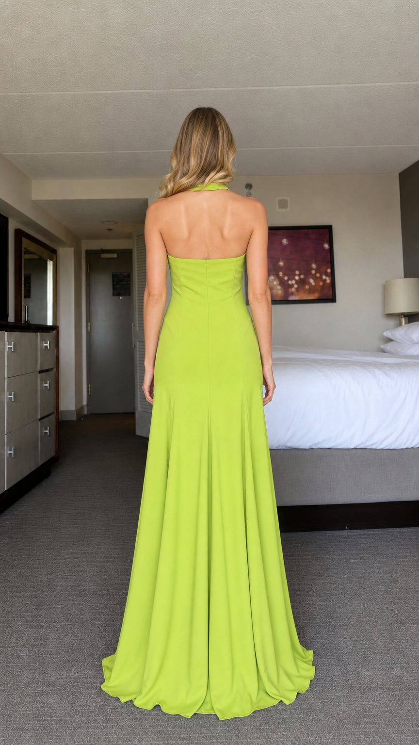 Model wearing lime green halter neck maxi dress from back view