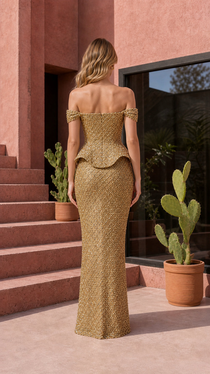 Back view of gold formal evening gown showcasing column silhouette