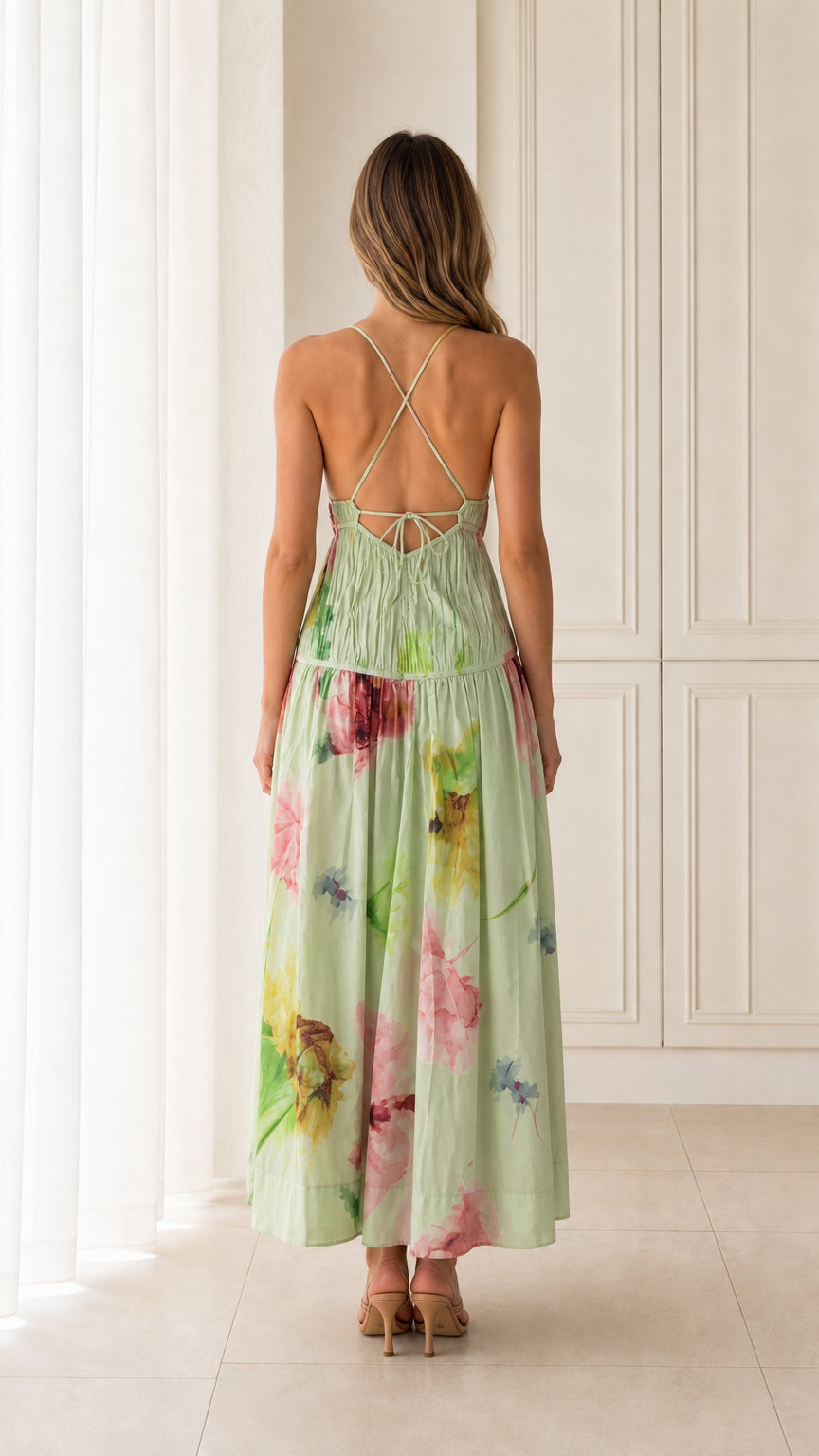 Back view showcasing cross-back straps of Light Green dress